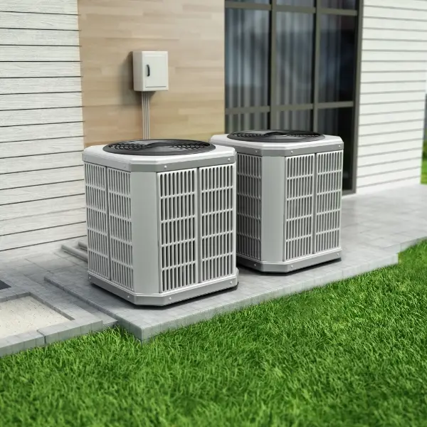 two heat pumps outside house